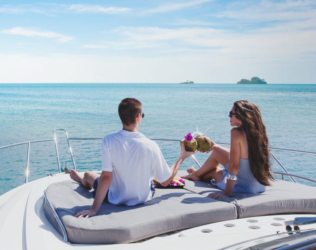 Couple-at-bow-of-yacht